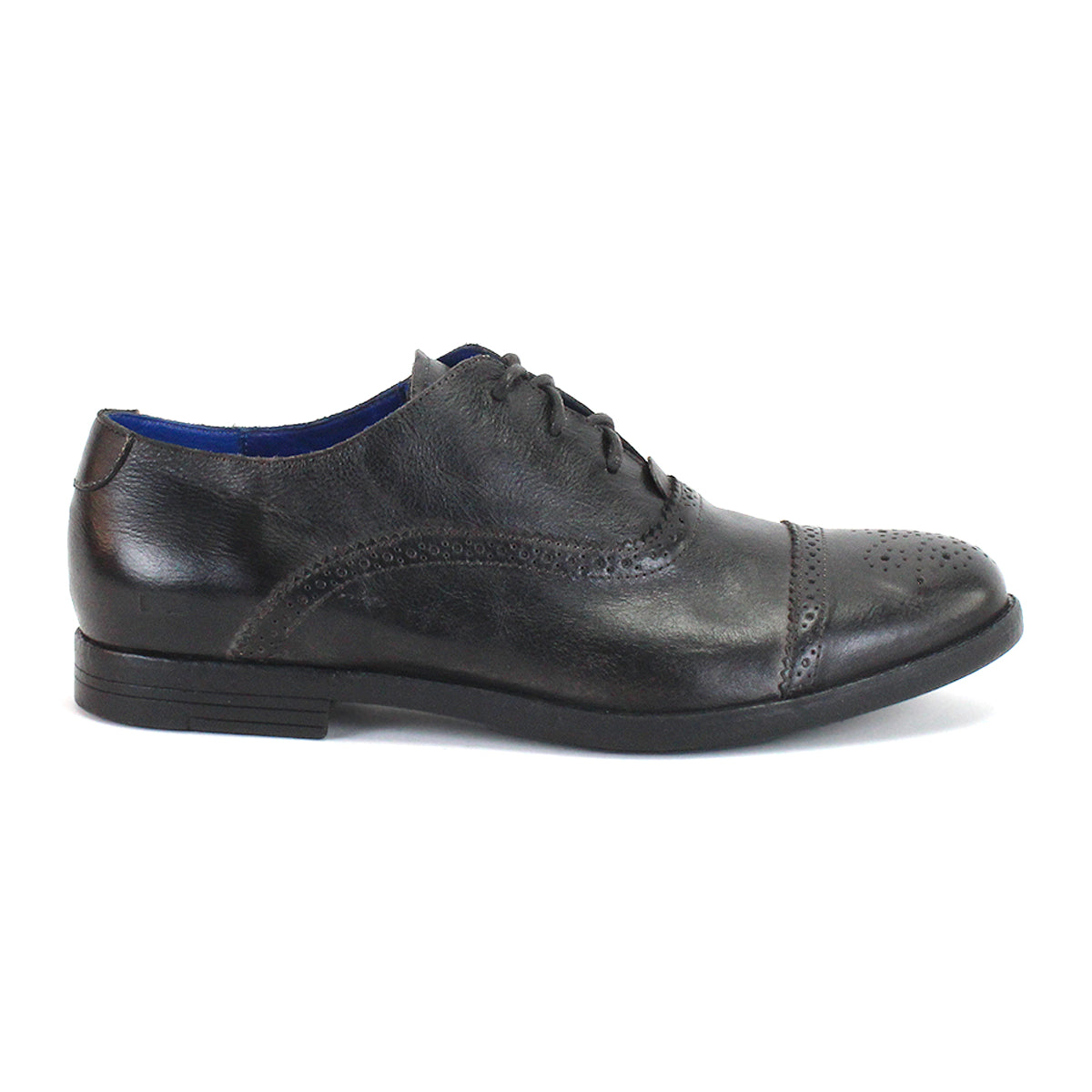 The Donatello II by Bed|Stü is a black leather oxford dress shoe featuring brogue detailing, a cap-toe design, and a black sole, all crafted from premium vegetable-tanned leather, shown here in a side profile view.
