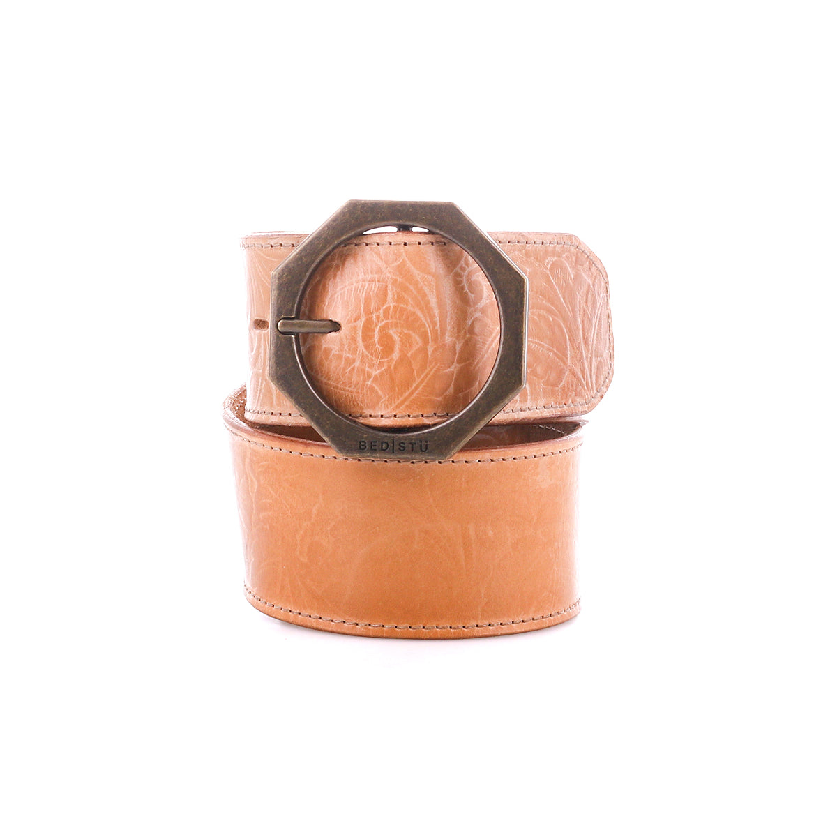 The Dreampath EM by Bed|Stü is a tan genuine leather belt featuring a subtle embossed pattern and a large, dark octagonal metal buckle, combining rugged durability with modern style against a white background.