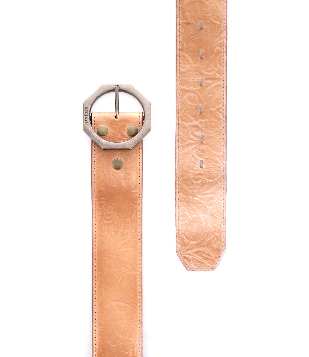 The Bed|Stü Dreampath EM is a wide tan genuine leather belt featuring embossed floral patterns, a large octagonal silver buckle, and two brass rivets. Displayed both buckled and flat against a white background, this modern belt offers timeless elegance paired with rugged durability.