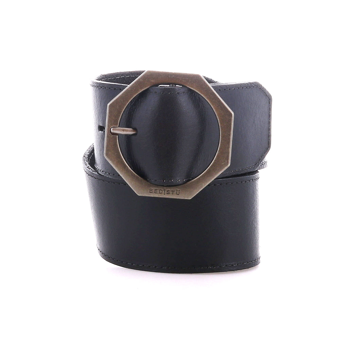 Bed|Stü's "Dreampath" genuine leather belt, coiled neatly against a white background and featuring a striking octagon brass buckle.