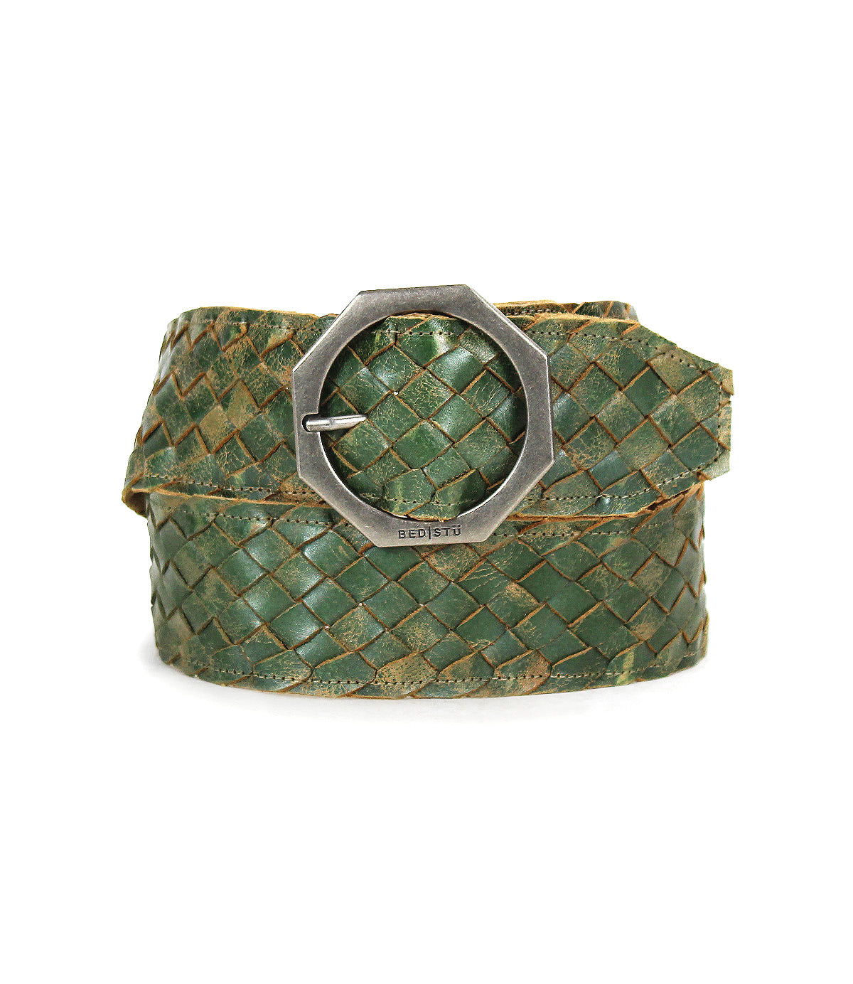 The Bed|Stü Dreamweaver, a green woven leather belt featuring artisan craftsmanship and a silver octagonal metal buckle, is coiled on a white background.