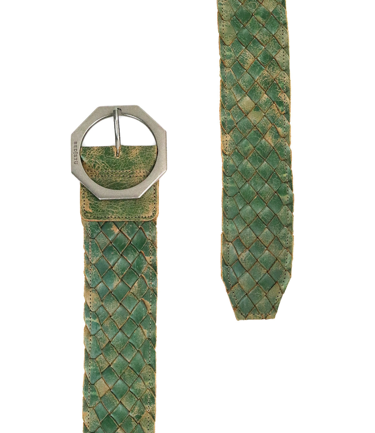 The Bed|Stü Dreamweaver is a green woven leather belt featuring a distinctive silver octagonal buckle, elegantly displayed against a white background to spotlight both the unique buckle and the belt tip. This accessory exemplifies artisan craftsmanship and effortlessly elevates any bohemian-inspired wardrobe.