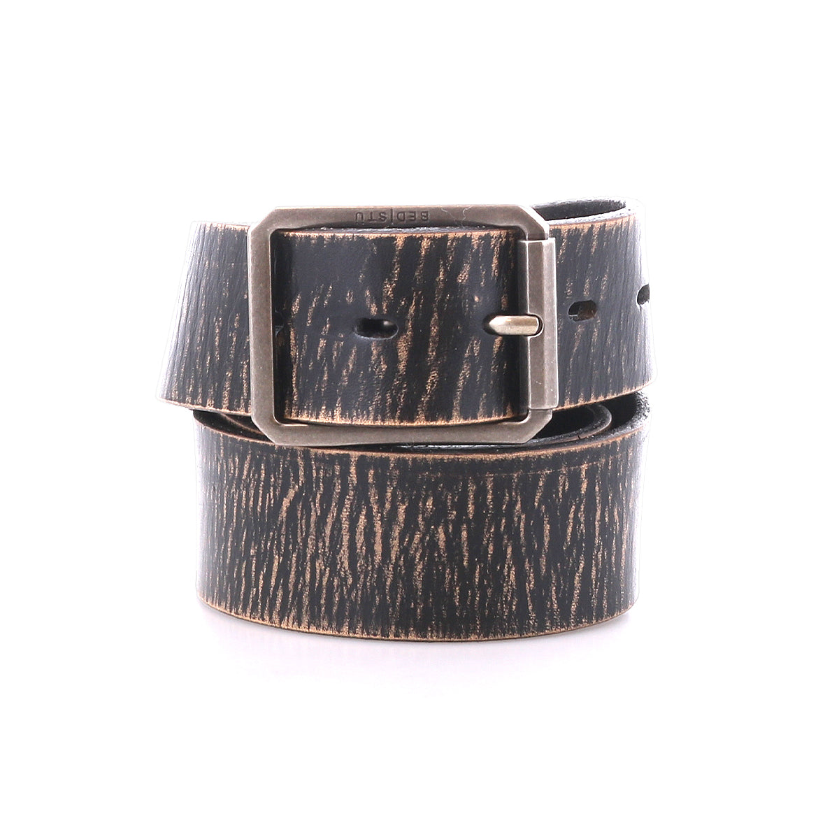 The Bed|Stü Drifter is a black and brown textured leather strap belt, featuring a rectangular silver metal buckle, coiled against a white background for a minimal style that complements any outfit.