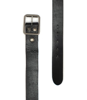 The Drifter belt by Bed|Stü is featured against a white background, showcasing its black textured leather strap with a metal buckle, two metal studs, and multiple adjustment holes. Its minimal design and refined craftsmanship make this versatile accessory an elegant addition to any wardrobe.