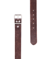 Two sections of the Drifter strap by Bed|Stü in brown textured leather with a minimal design are shown—one featuring the metal buckle and the other displaying multiple adjustment holes.
