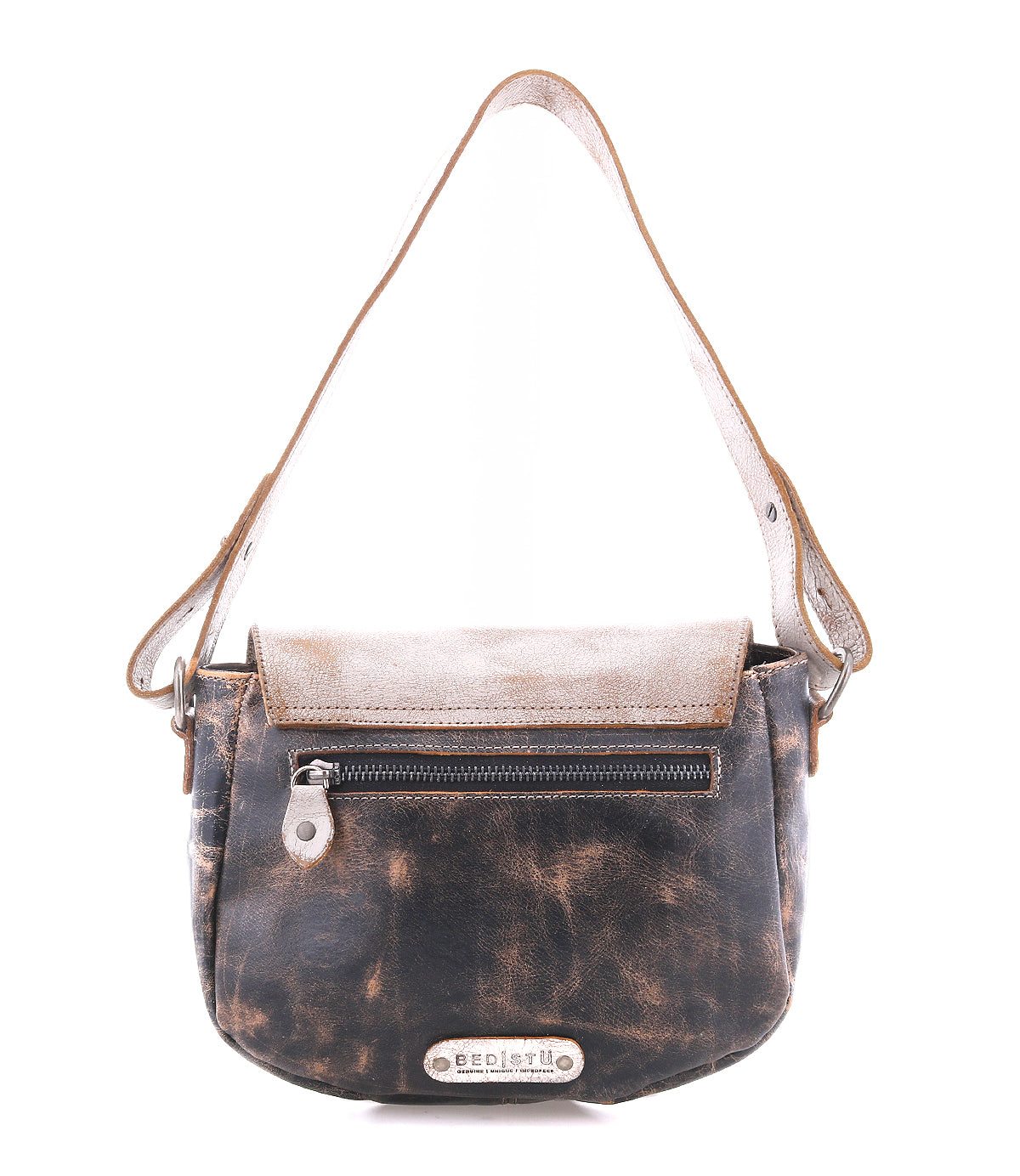 The Bed|Stü Elect is a distressed brown leather shoulder bag featuring a front zipper pocket, flap closure, and a metal brand plate at the bottom front, offering vintage charm perfect for everyday use.