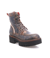 The Elisha Hi by Bed|Stü is a brown leather lace-up boot with a thick black lug sole, side zipper, and visible stitching, showcasing its classic lace-up profile against a white background.