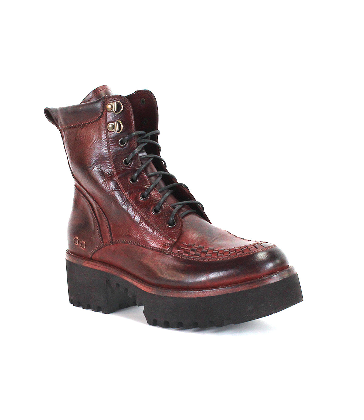 The Bed|Stü Elisha Hi is a single brown leather lace-up boot featuring visible stitching, a handwoven toe detail, and a thick black rugged sole, photographed on a white background.