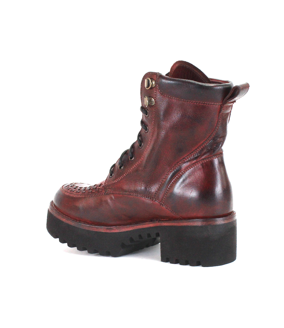 The Elisha Hi boot by Bed|Stü is displayed singly against a white background, positioned to showcase its maroon leather upper, side profile, and chunky black lug sole. Classic lace-up styling lends timeless appeal, while a handwoven toe detail highlights the artisanal craftsmanship of this distinctive design.