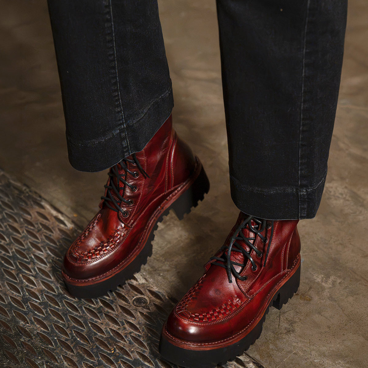 Bed|Stü Elisha Hi deep red leather platform shoes with a lace-up profile, handwoven moc-toe detail, and thick lugged soles.