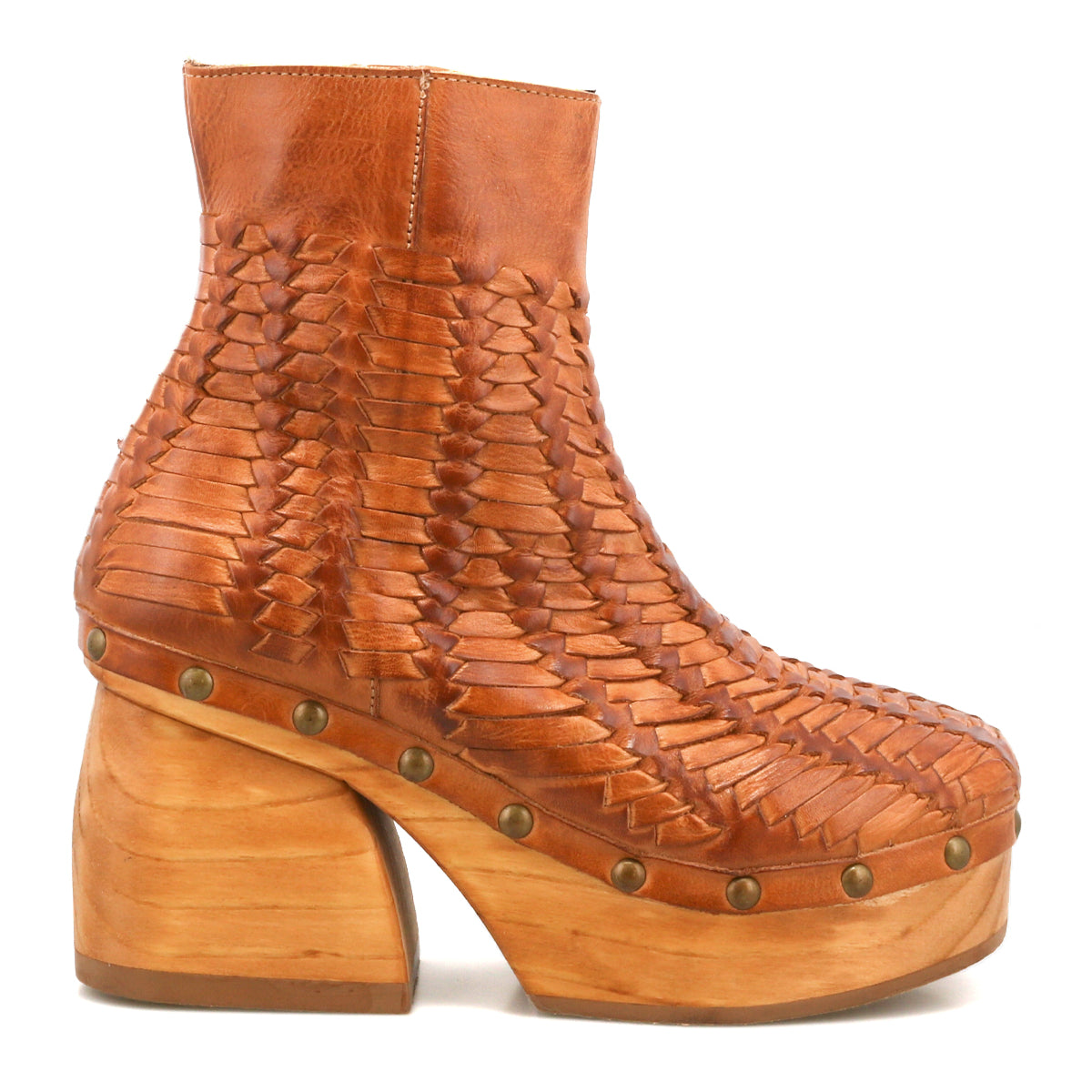 Introducing Ellasphin by Bed|Stü: These handwoven brown leather ankle boots feature a chunky wooden platform heel, brass stud accents along the sole, and a closed toe—making them the epitome of artisan fashion.