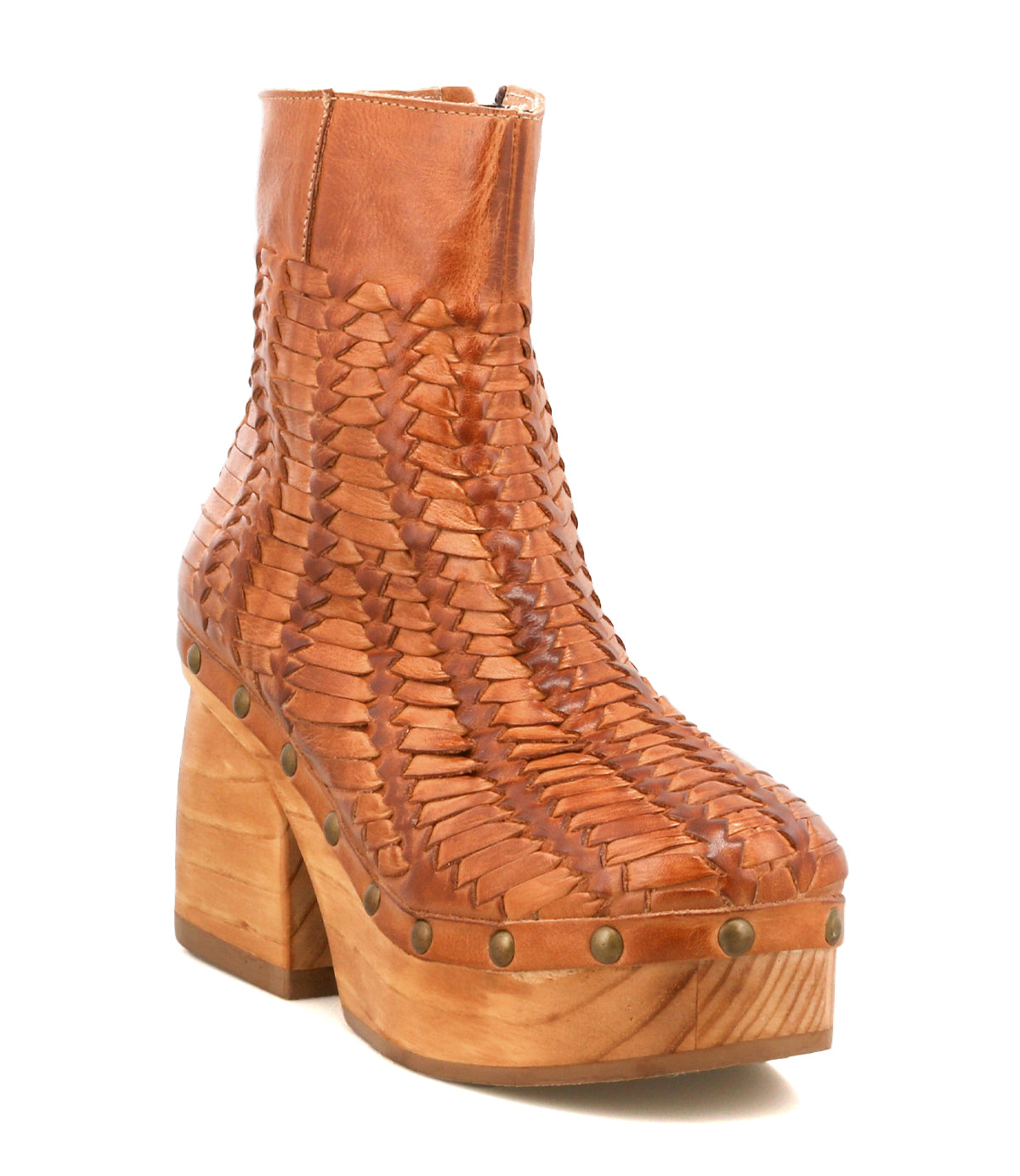 Introducing the Ellasphin by Bed|Stü—a tan woven leather platform boot featuring a wooden chunky heel and brass stud accents along the sole. This ankle-high, closed-toe design delivers an elevated, sculptural take on artisan fashion for those who appreciate distinctive statement footwear.