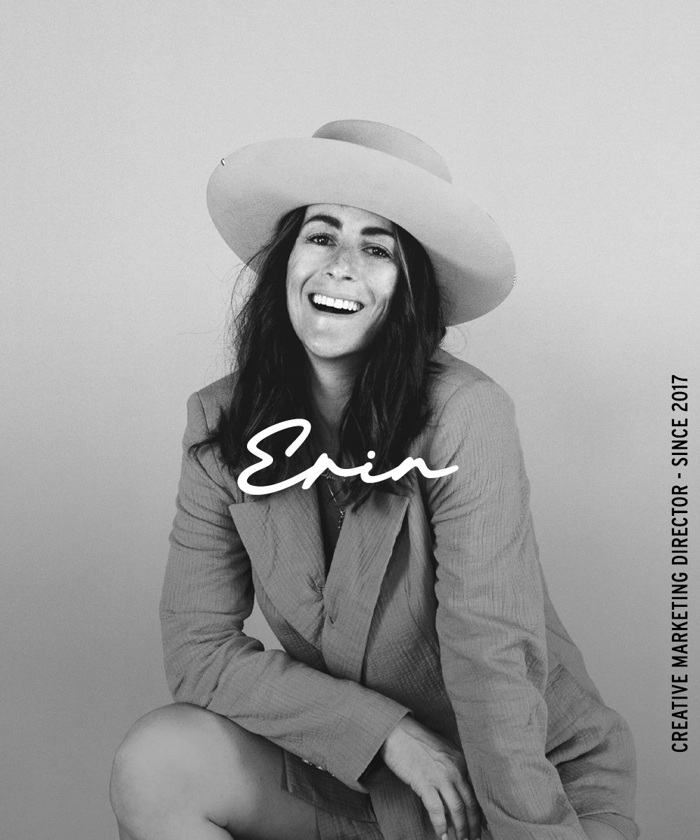 Black-and-white portrait of a smiling woman with the name “Erin” overlaid and vertical text reading “Creative Marketing Director · Since 2017.”
