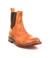 Showcased on a white background, the Bed|Stü "Ethic" is a durable brown leather Chelsea boot featuring elastic side panels, a pull tab, a low heel, and leather lining for added comfort.