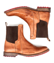 A pair of Bed|Stü Ethic Chelsea boots crafted from durable tan leather with leather lining, featuring dark brown elastic side panels, red rubber soles, and low wooden heels, displayed side by side on a white background.