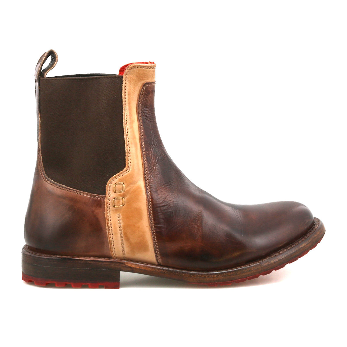 The Bed|Stü Ethic is a brown leather Chelsea boot featuring a beige side panel, black elastic gusset, red outsole accents, and a back pull tab—pictured here from the left side. Durable and fully leather-lined, the Ethic Chelsea boot seamlessly blends signature style with lasting comfort.