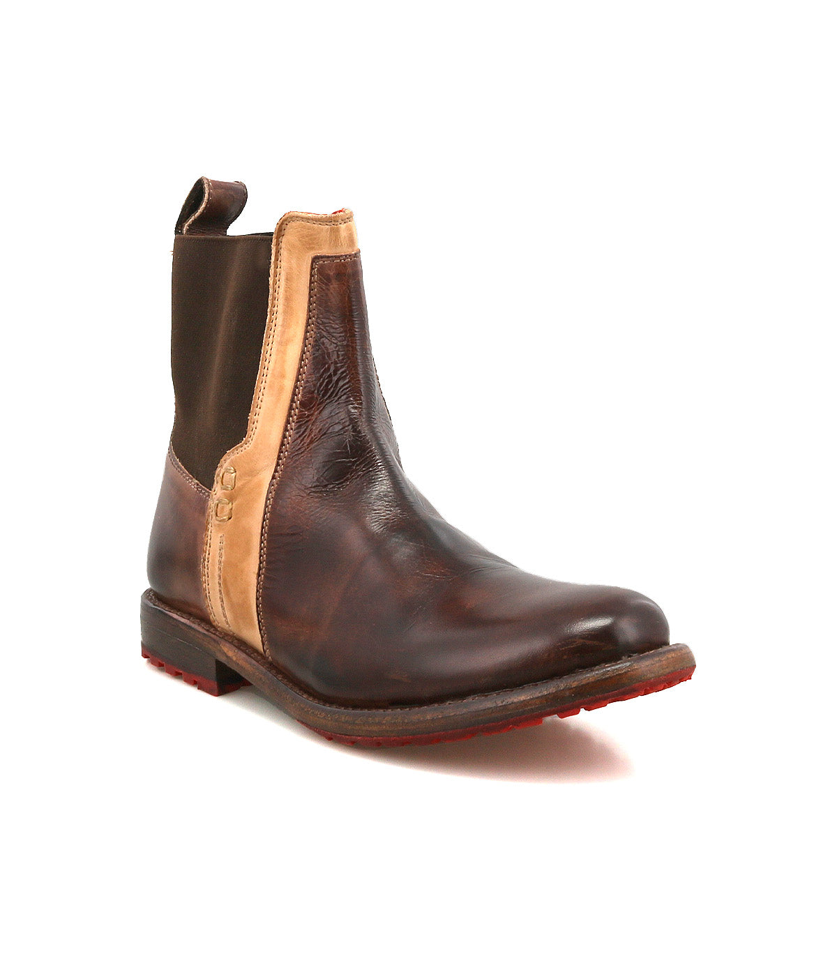 The Bed|Stü Ethic is a brown leather-lined Chelsea boot featuring a tan elastic side panel, a pull tab at the back, and a durable red-tinted sole, displayed against a white background.