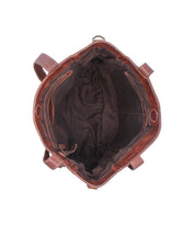 Top view of an open Bed|Stü Explicit LTC brown leather bag, featuring a dark fabric lining and visible inner pockets, photographed against a white background. This tote blends rustic charm with everyday reliability, offering both style and practicality.