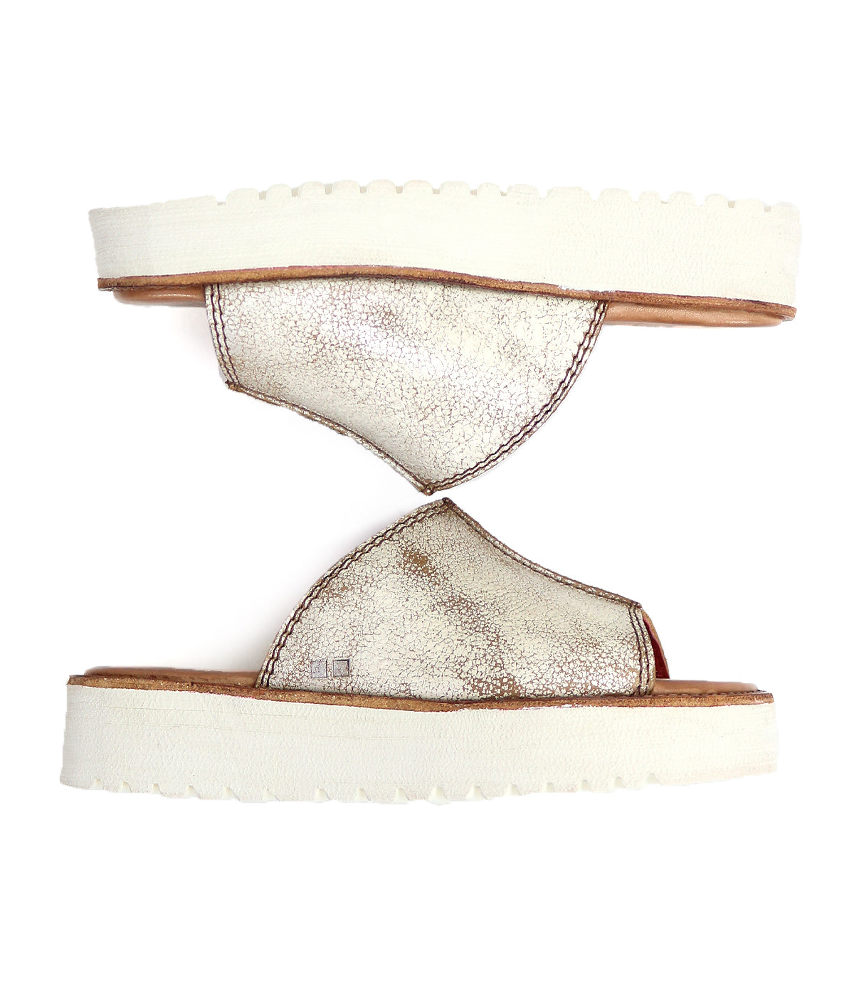 Two Bed|Stü Fairlee II metallic silver leather flatform sandals with thick white platform soles and a cushioned footbed, positioned sole to sole against a white background.