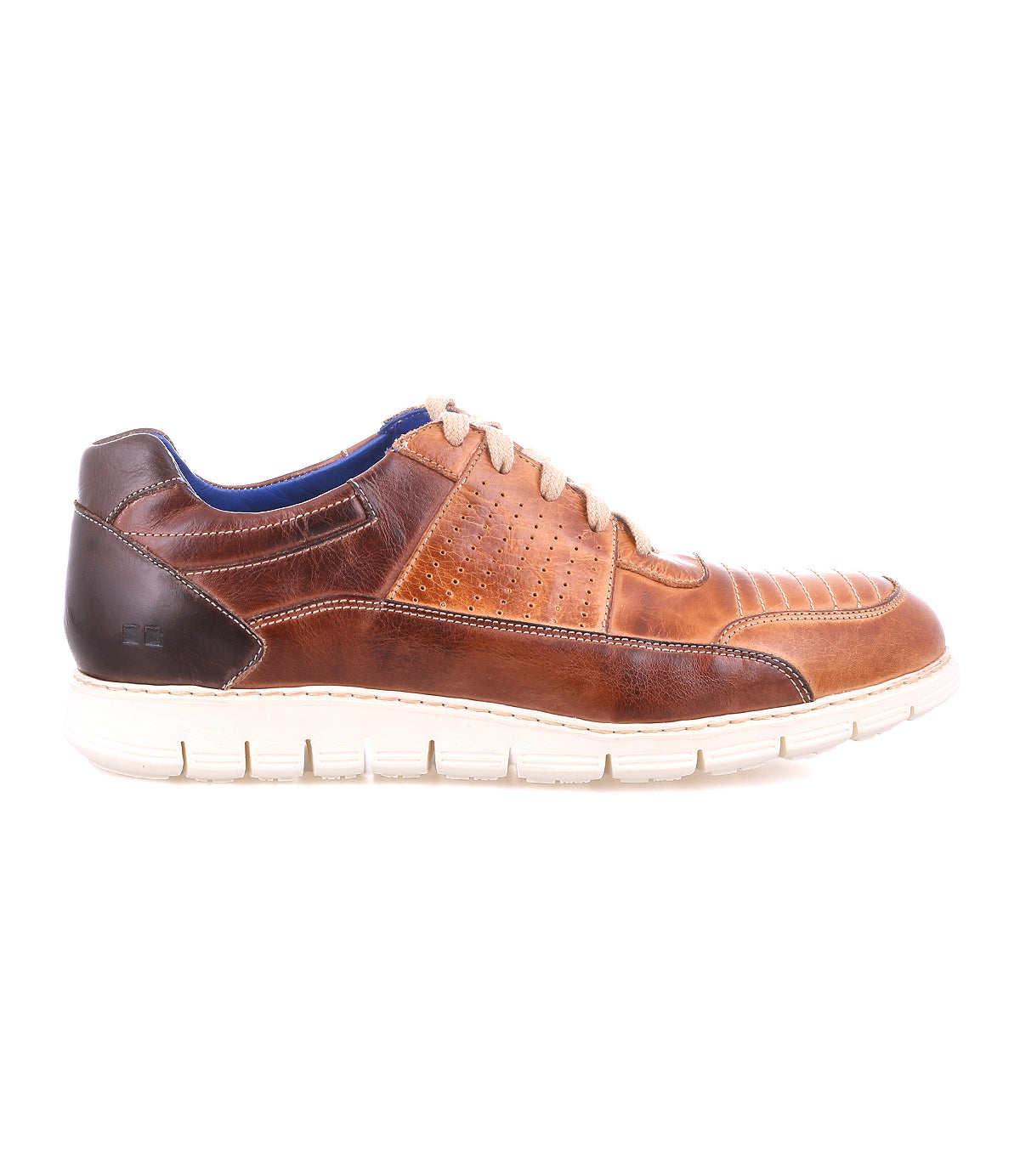 The Fairman men's sneaker from Bed|Stü is crafted from three-tone leather in brown and tan, featuring a white lightweight sole, tan laces, perforated side details, and a contrasting dark brown heel—all showcased on a white background.