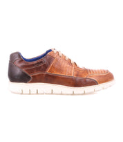The Fairman men's sneaker from Bed|Stü is crafted from three-tone leather in brown and tan, featuring a white lightweight sole, tan laces, perforated side details, and a contrasting dark brown heel—all showcased on a white background.