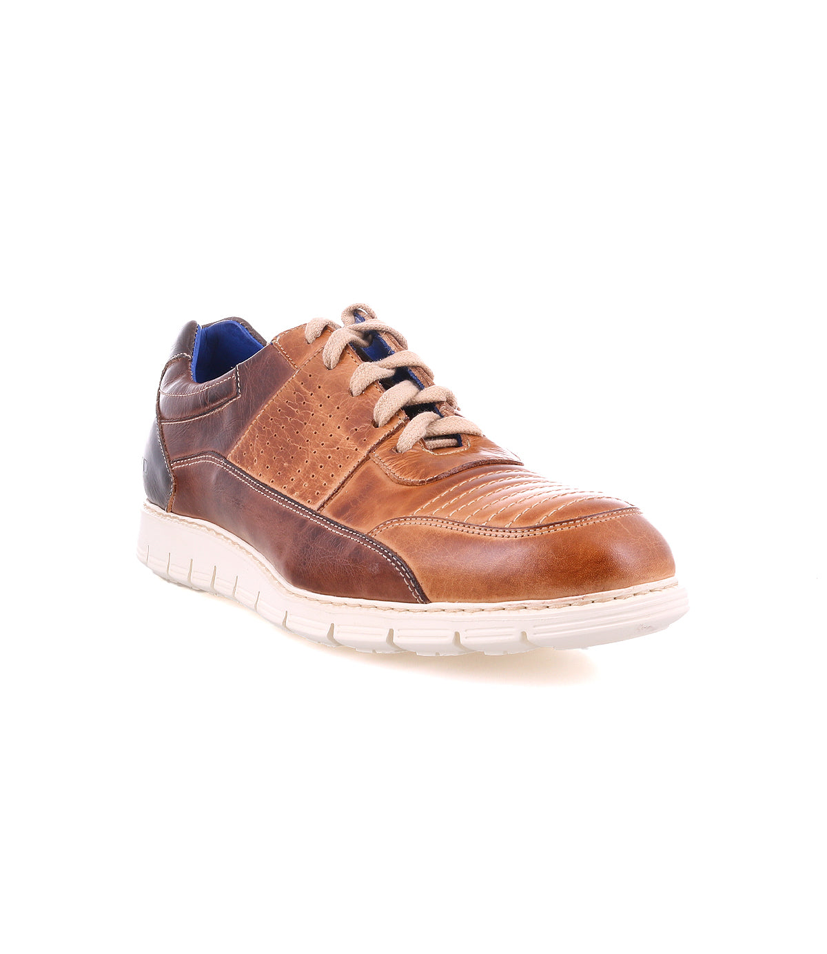 The Bed|Stü Fairman is a brown three-tone leather men's sneaker, showcased on a white background, featuring tan laces, a lightweight sole, and a contrasting dark brown and blue patch on the heel.