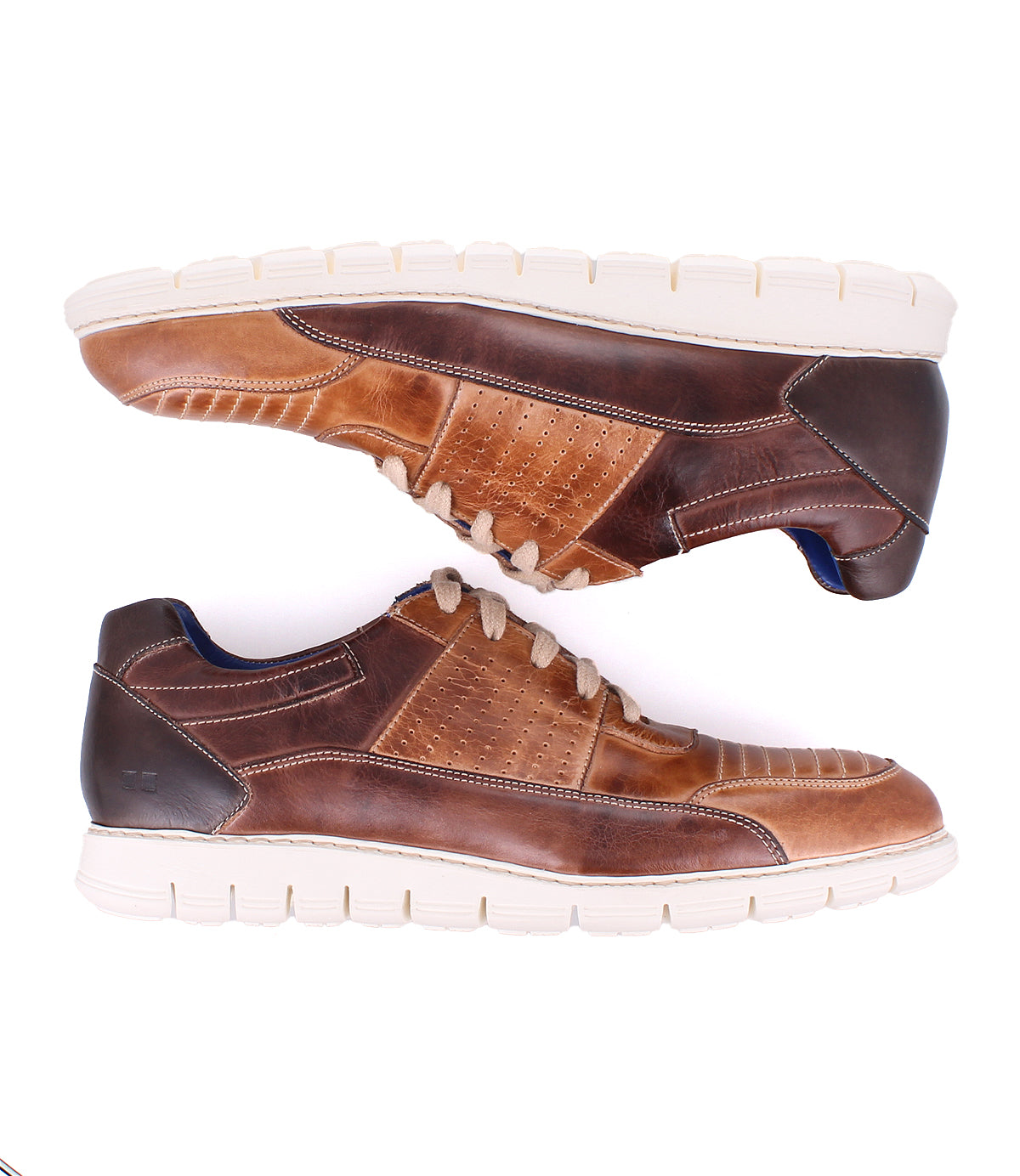 A pair of Bed|Stü Fairman men's brown three-tone leather sneakers with white, lightweight rubber soles, shown from the side and placed parallel against a white background.