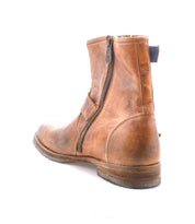 A single Bed|Stü Fellow tan leather ankle boot with sturdy Goodyear welt construction, featuring a side zipper and visible wear and creasing, photographed on a white background.