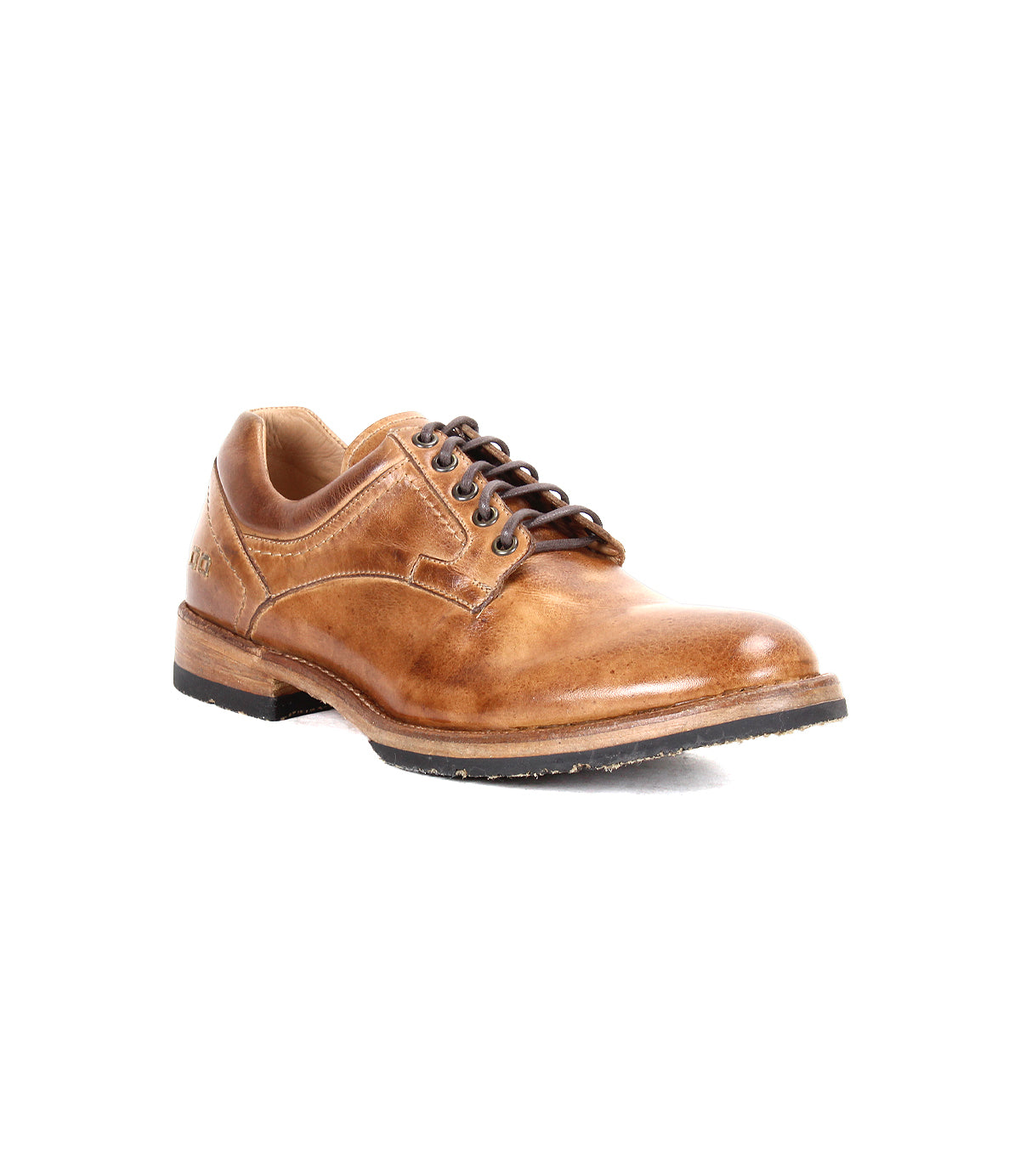 A single Fierce derby lace-up dress shoe by Bed|Stü, crafted from tan washed leather with a black Goodyear welt sole, is pictured on a white background at an angle highlighting the front and side views.