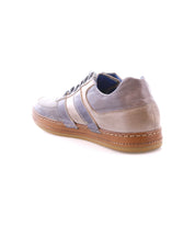 Firepower by Bed|Stü is a gray casual everyday sneaker featuring beige and blue accents, white leather stripe details on the sides, brown stitching, and a light brown textured rubber sole, shown angled from the back.