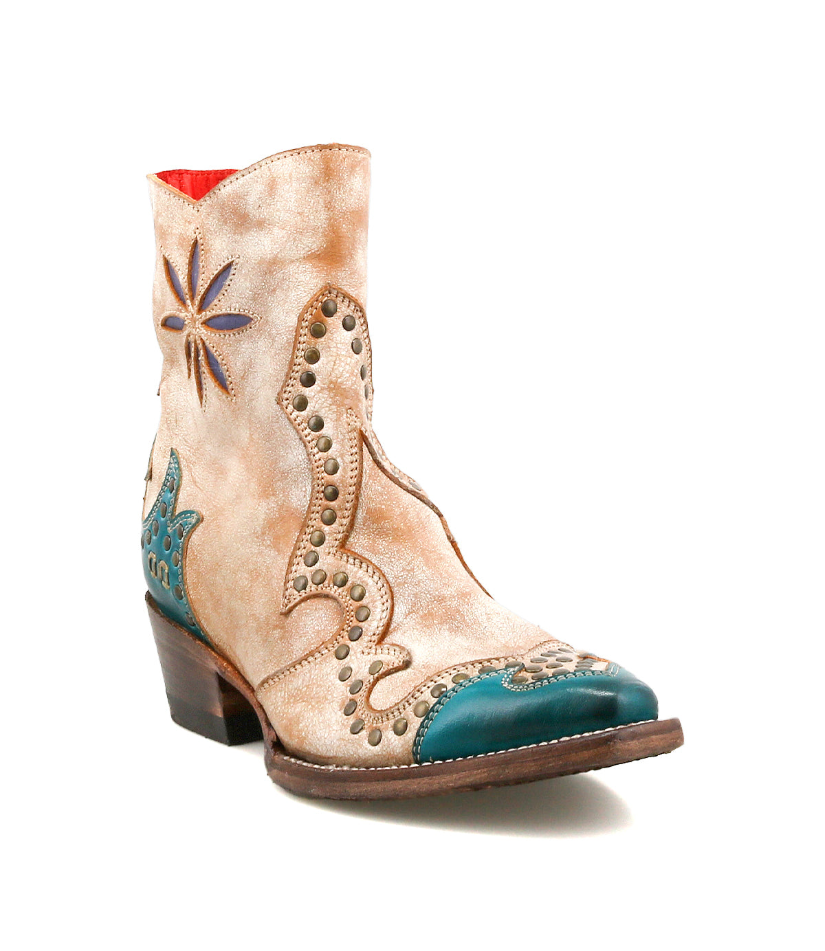 Introducing the Bed|Stü Frio: a tan and teal leather Western bootie featuring decorative stitching, floral cutout details, antiqued brass studs, a star design on the side, a low heel, and a pointed toe.