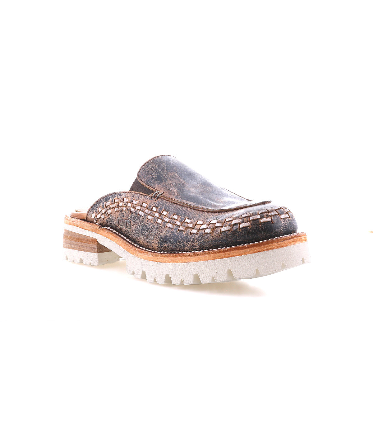 The Bed|Stü Fuel is a brown leather slip-on clog featuring handwoven detailing and a chunky white XL EXTRALIGHT outsole, shown on a plain white background.