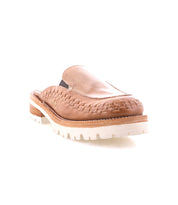 Bed|Stü Fuel is a tan leather slip-on clog showcasing handwoven leather detailing, a chunky white ridged XL EXTRALIGHT outsole, and a low wooden heel, photographed on a white background. This lightweight clog blends artisanal craftsmanship with modern comfort.