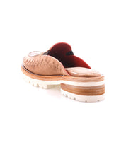 Fuel by Bed|Stü: A tan handwoven leather slip-on with distinctive visible stitching, low heel, and red interior, featuring a white treaded XL EXTRALIGHT outsole; shown from the back on a white background.