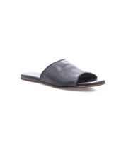 Introducing the Gailee by Bed|Stü: a comfortable black leather slide sandal with an open toe, cushioned footbed, and flat sole, shown from a slight angle against a white background.