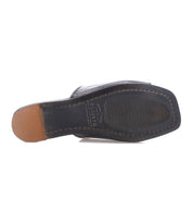 The image shows the bottom view of the Gailee black dress shoe by Bed|Stü, featuring a square toe and visible stitching along the sole, which highlights its comfortable design and cushioned footbed.