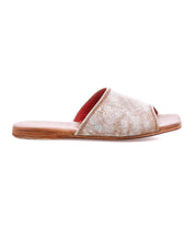 The Bed|Stü Gailee is a single brown open-toe leather slide sandal with a flat sole and textured upper, featuring a cushioned footbed for extra comfort, shown in a side view on a white background.