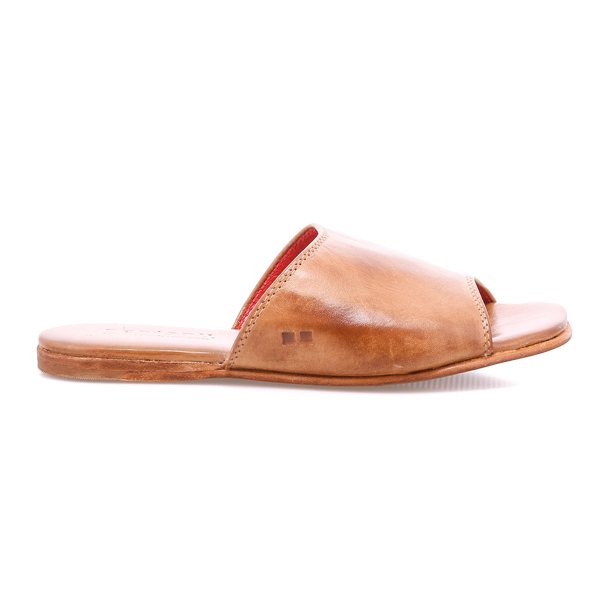 The Gailee by Bed|Stü is a tan leather slide sandal with an open toe and flat sole, featuring a comfortable cushioned footbed, shown from the side against a white background.