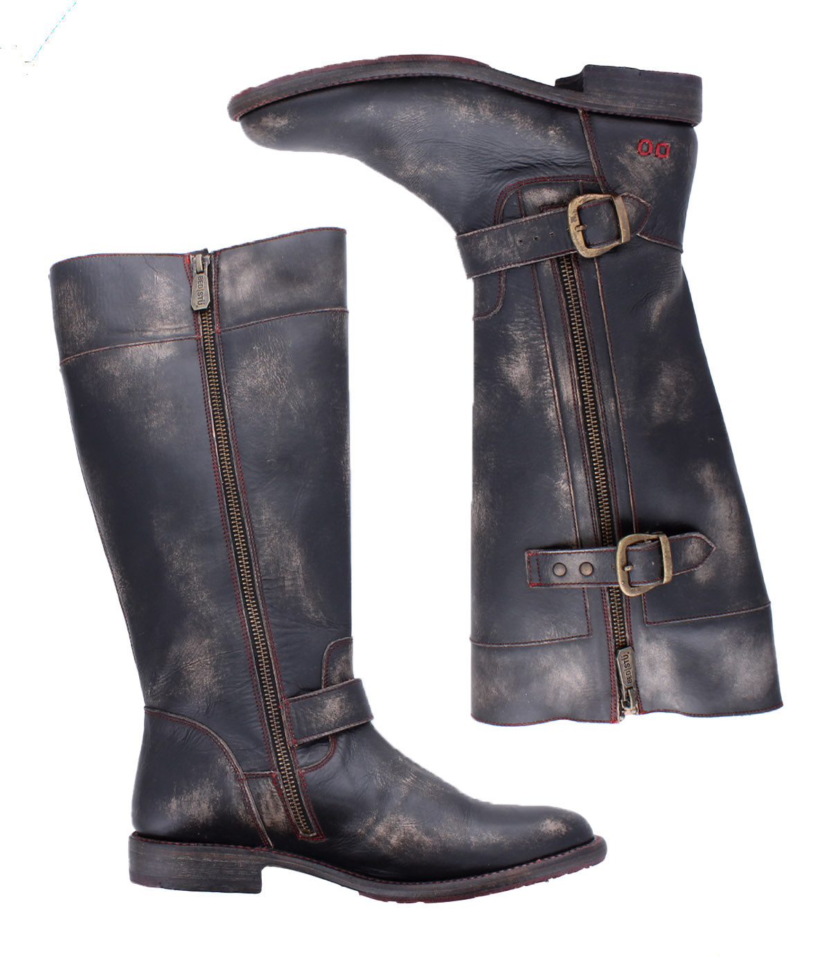 Two tall, black leather Bed|Stü Gogo Lug engineer boots with side zippers, buckles, and a distressed finish are shown against a white background. These mid-calf Gogo Lug boots feature rugged details and a sturdy lug outsole for added durability.