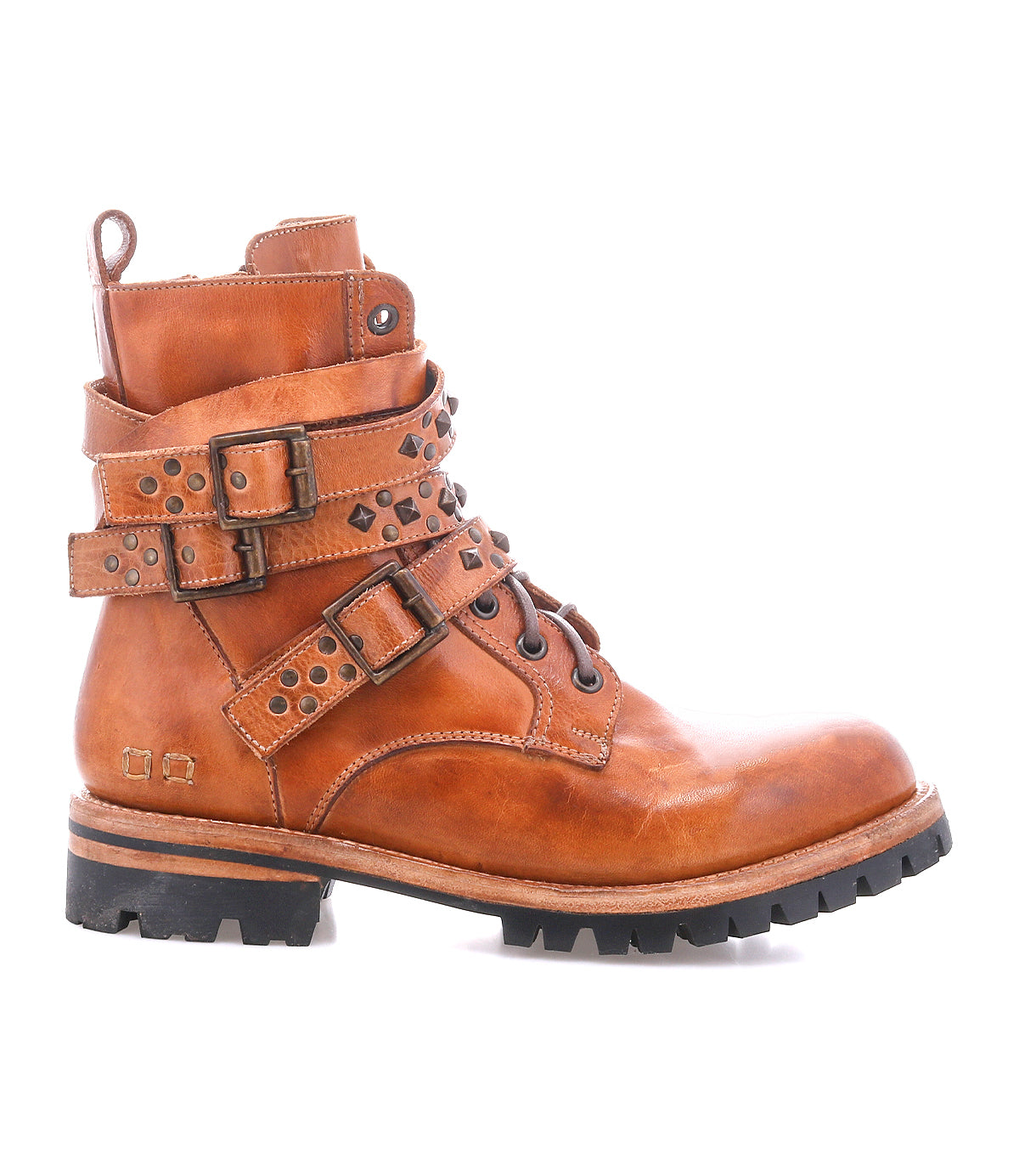 The Bed|Stü Grab boot is a brown leather combat style featuring studded buckle straps, a black Vibram sole, metal eyelets, and decorative studs, displayed in profile facing left against a white background.