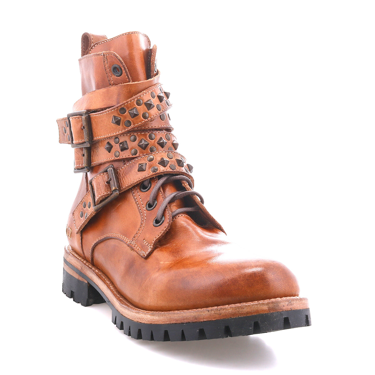 Bed|Stü "Grab" brown leather combat boot featuring a durable Vibram sole, decorative studded buckle straps, and side buckles, photographed on a white background.