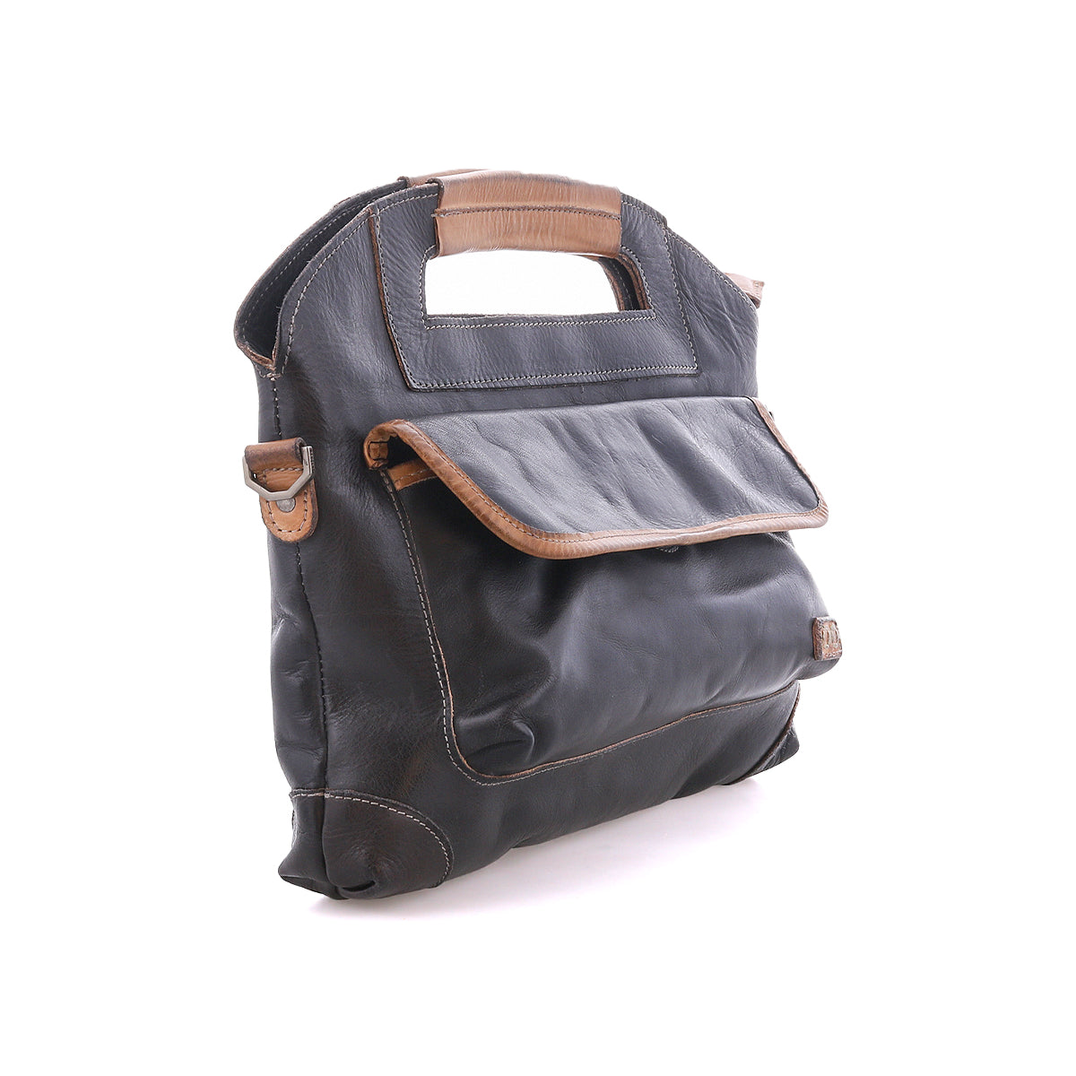 The Greenway by Bed|Stü is a black full-grain leather satchel with brown trim, designed with a front flap, side pocket, rectangular cutout handles, and a convenient zip-top closure. This elegant bag is photographed against a white background.