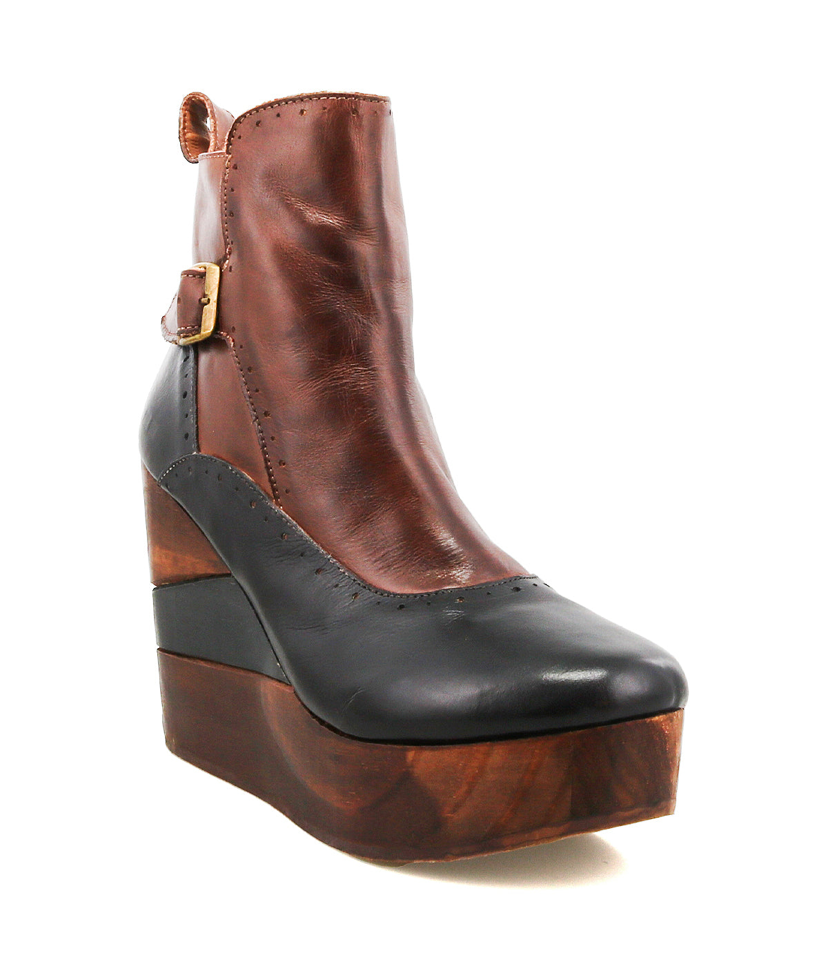 Introducing the Bed|Stü Harmonious: a platform wedge ankle boot with brown and black leather uppers, a thick sculpted wooden wedge heel, decorative buckle detailing, and a sturdy platform sole.