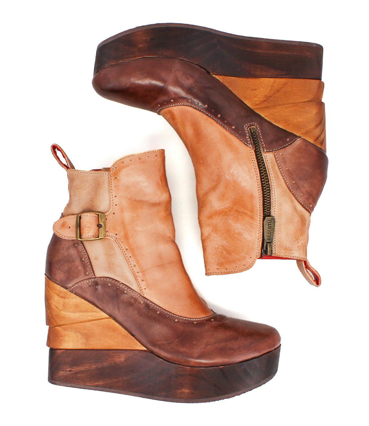 The Harmonious platform wedge ankle boot by Bed|Stü features two-tone leather uppers, a sculpted wood base, side zipper, buckle detail, and pull tab—displayed against a white background.