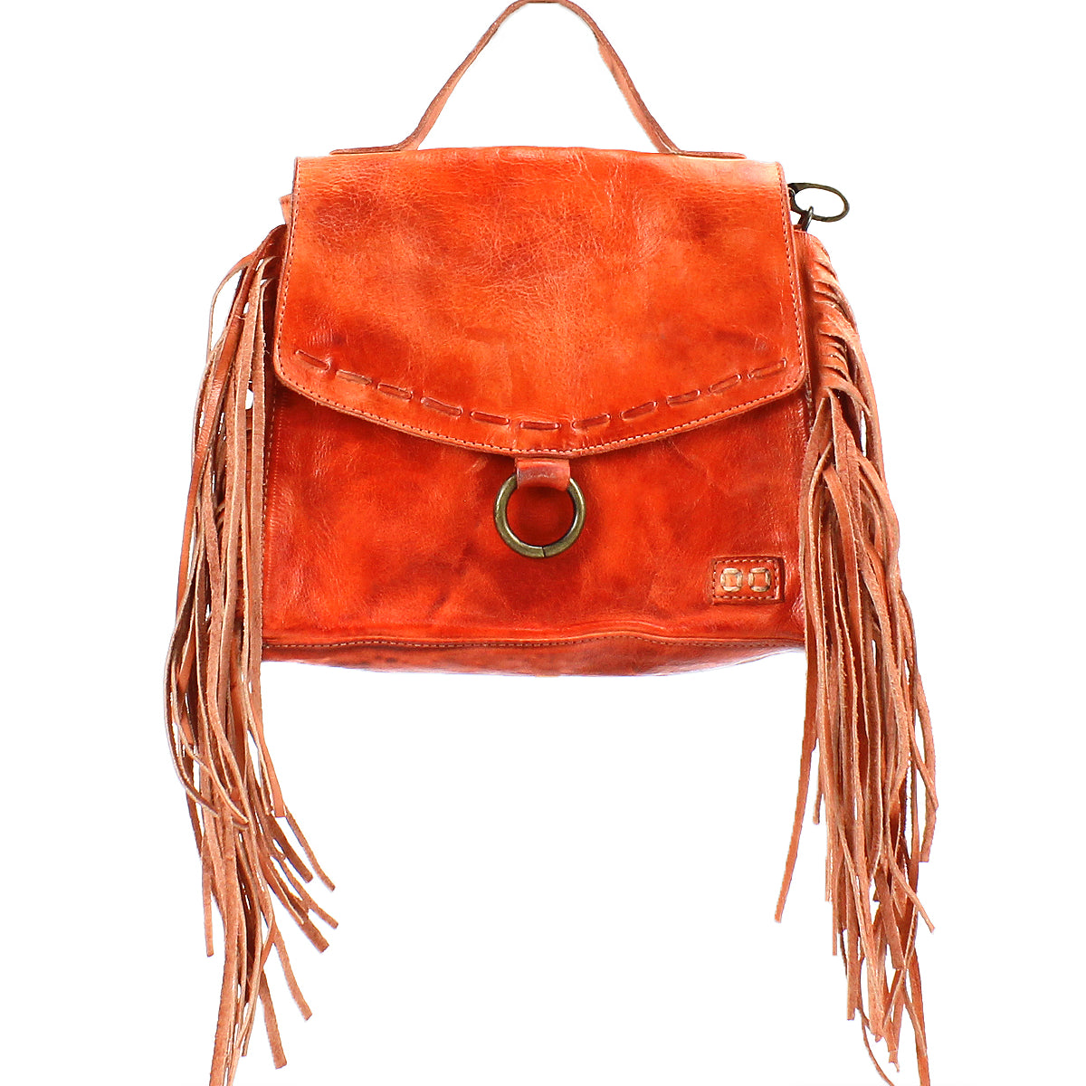 Bed|Stü's "Hidden" handbag in orange features soft leather construction, a top handle, a front flap with a metal ring closure, and long fringe accents on both sides, displayed against a white background.