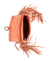 Bed|Stü's "Hidden" purse in coral-hued leather showcases a structured silhouette with fringed detailing, displayed open to reveal its interior lining and a metal ring accent on the flap.