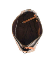 Top view of an open Bed|Stü Hyperbolic tan leather shoulder bag with a zippered closure, revealing a dark fabric interior featuring inner pockets and a small attached key clip. This bohemian-inspired design beautifully merges style and function through its handcrafted details.