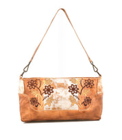 The Bed|Stü Hyperbolic is a handcrafted brown leather shoulder bag with yellow and brown floral embroidery, designed in a rectangular shape with a single strap for a bohemian touch, showcased against a white background.
