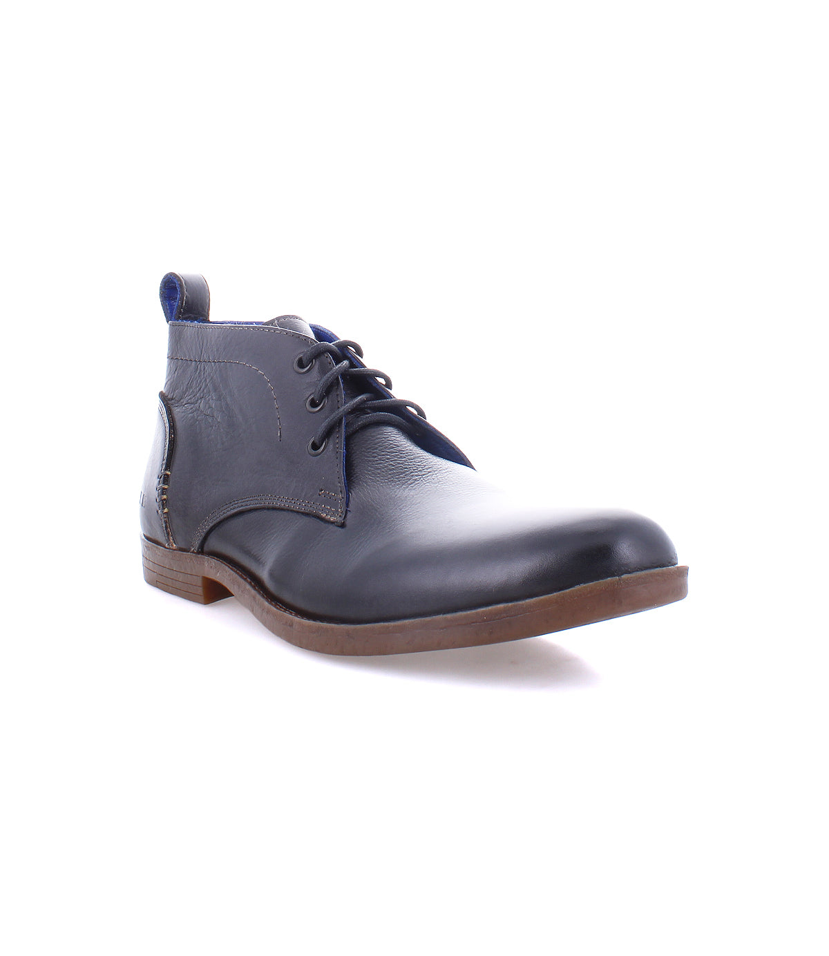 The Bed|Stü Illiad, a single black leather dress shoe featuring a modern lace-up design, brown sole, comfortable outsole, and slight heel, is displayed on a white background.