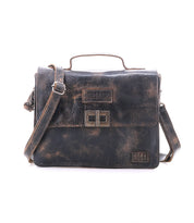 Bed|Stü Improv distressed brown leather mini purse featuring a top handle, adjustable crossbody strap, and front clasp closure, photographed against a white background.